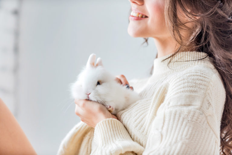 Women with white dwarf rabbit